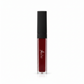 A clear rectangular tube of liquid lipstick with deep burgundy red liquid inside and a matte black cap, featuring a white script logo on the front, set against a plain white background.