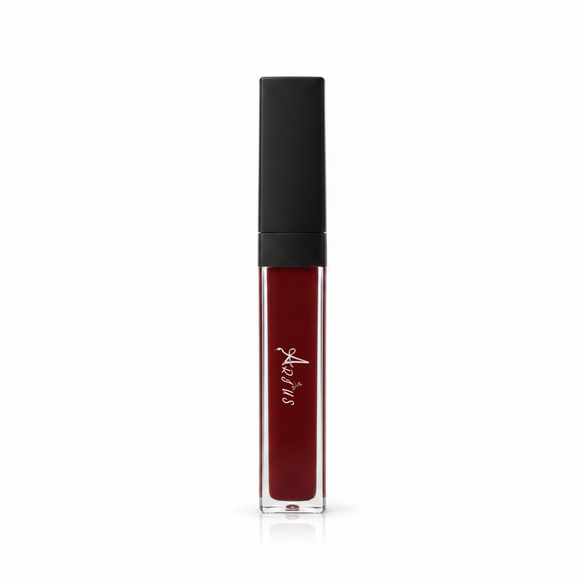 A clear rectangular tube of liquid lipstick with deep burgundy red liquid inside and a matte black cap, featuring a white script logo on the front, set against a plain white background.