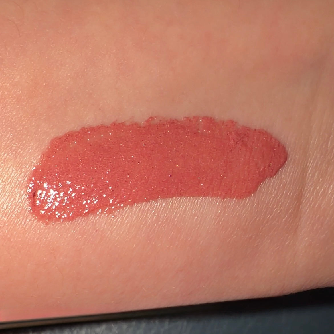 Pink lip butter balm 013 swatch on a person's skin