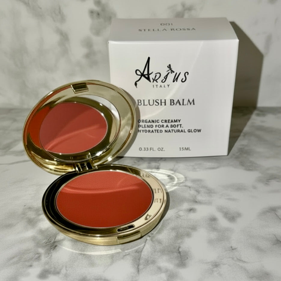 Arius Italy open blush balm with gold casing and closed box labeled 'Arius' on a marble surface